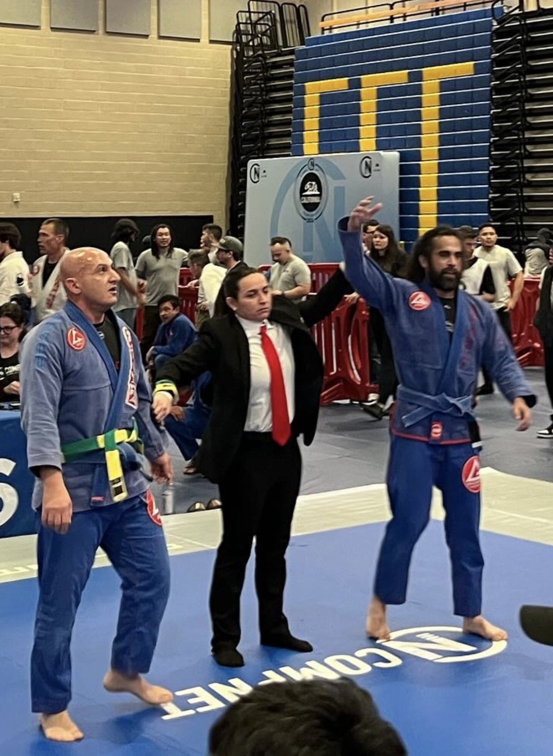 Matt getting his hand raised after a tournament win