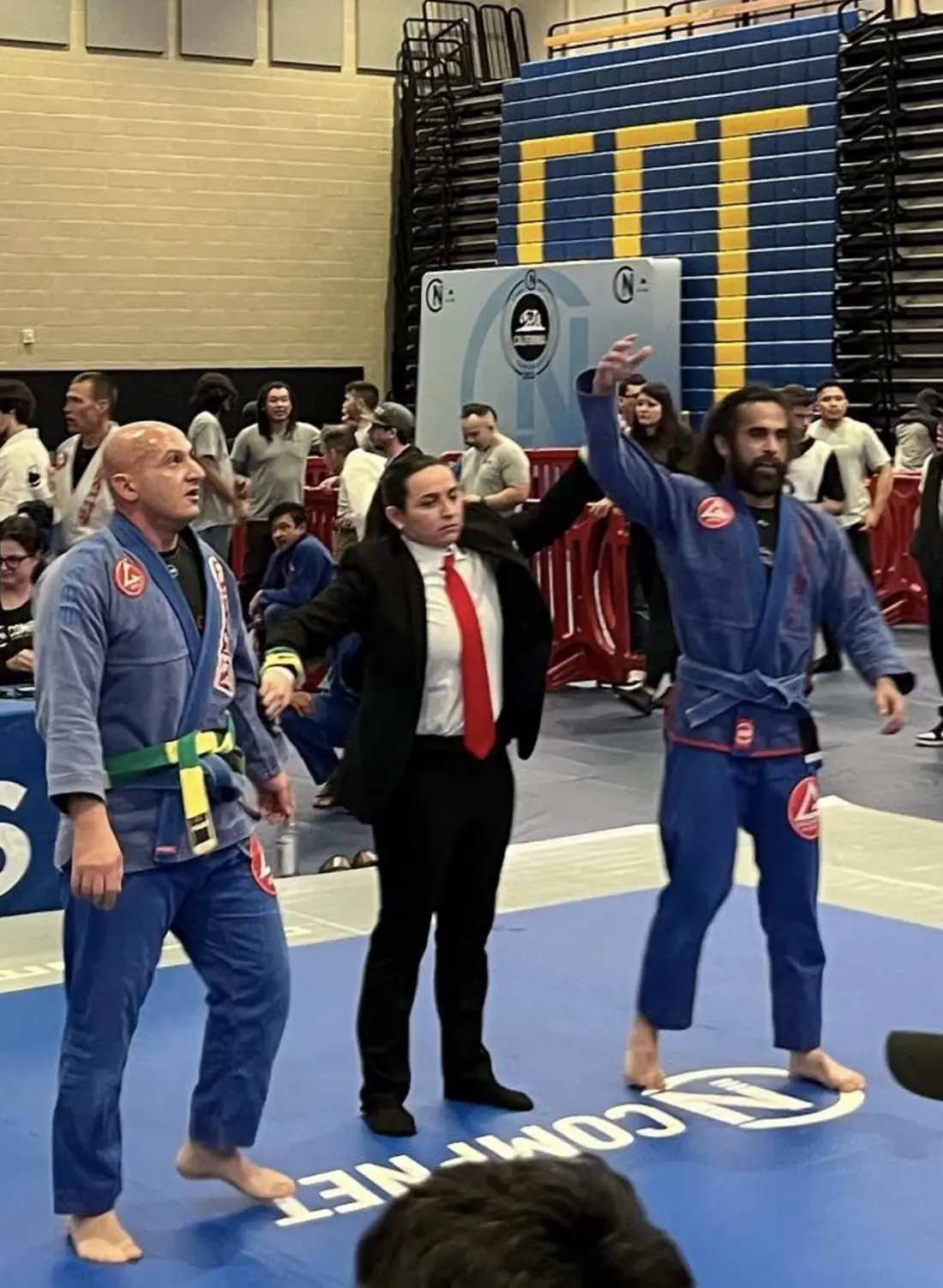 Matt getting his hand raised after a tournament win